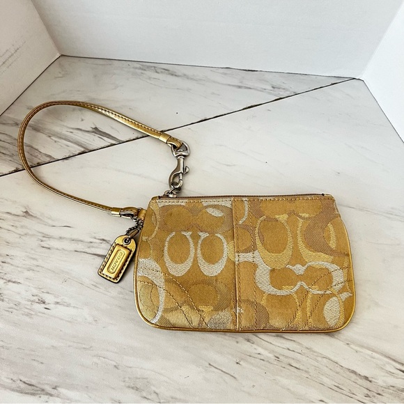 Coach Handbags - Coach Wristlet Zip Closure Gold And Silver Tone Treads Pink Lined